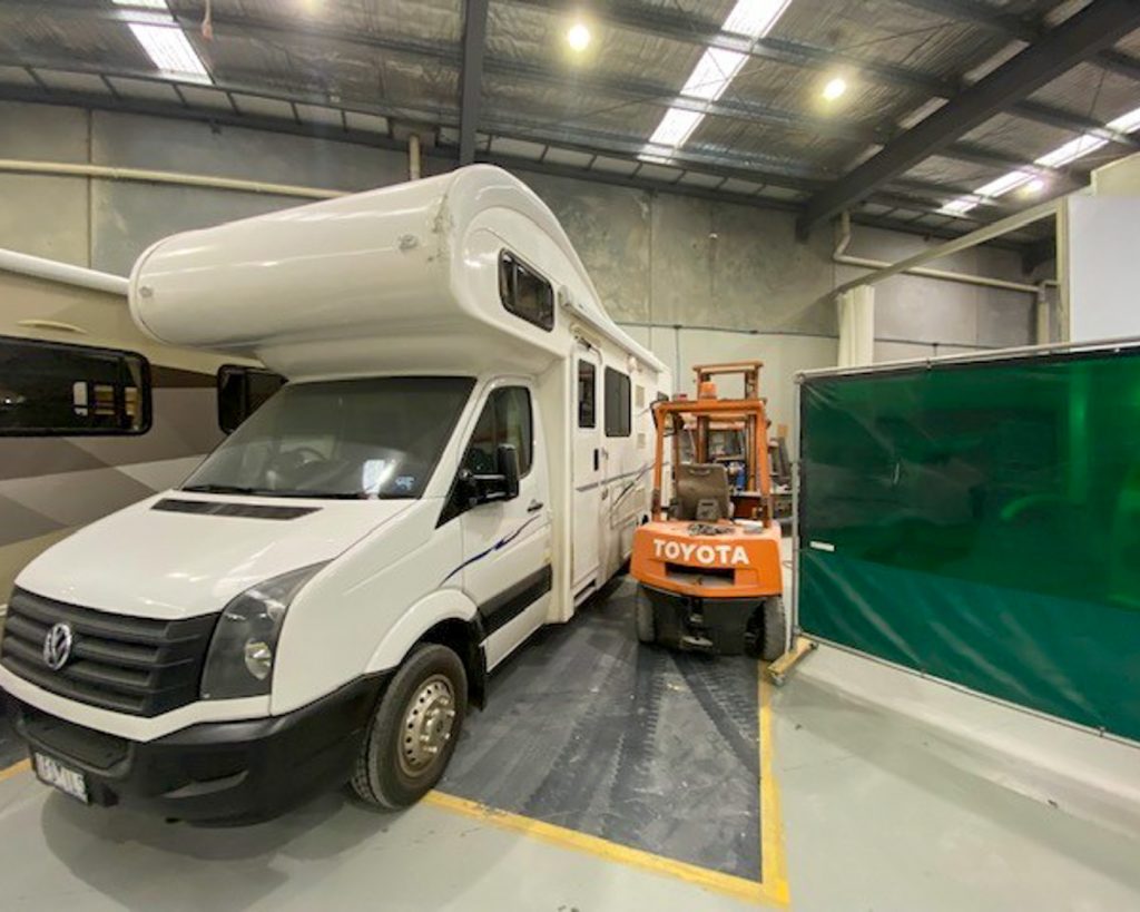 Front view of motorhome in Roadtrek workshop